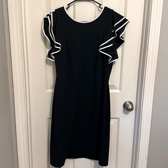 Tommy Hilfiger Dresses & Skirts - Navy Tommy Hilfiger Dress with ruffle sleeve detail